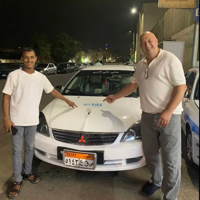 Late-night airport pickup transfer with Tito